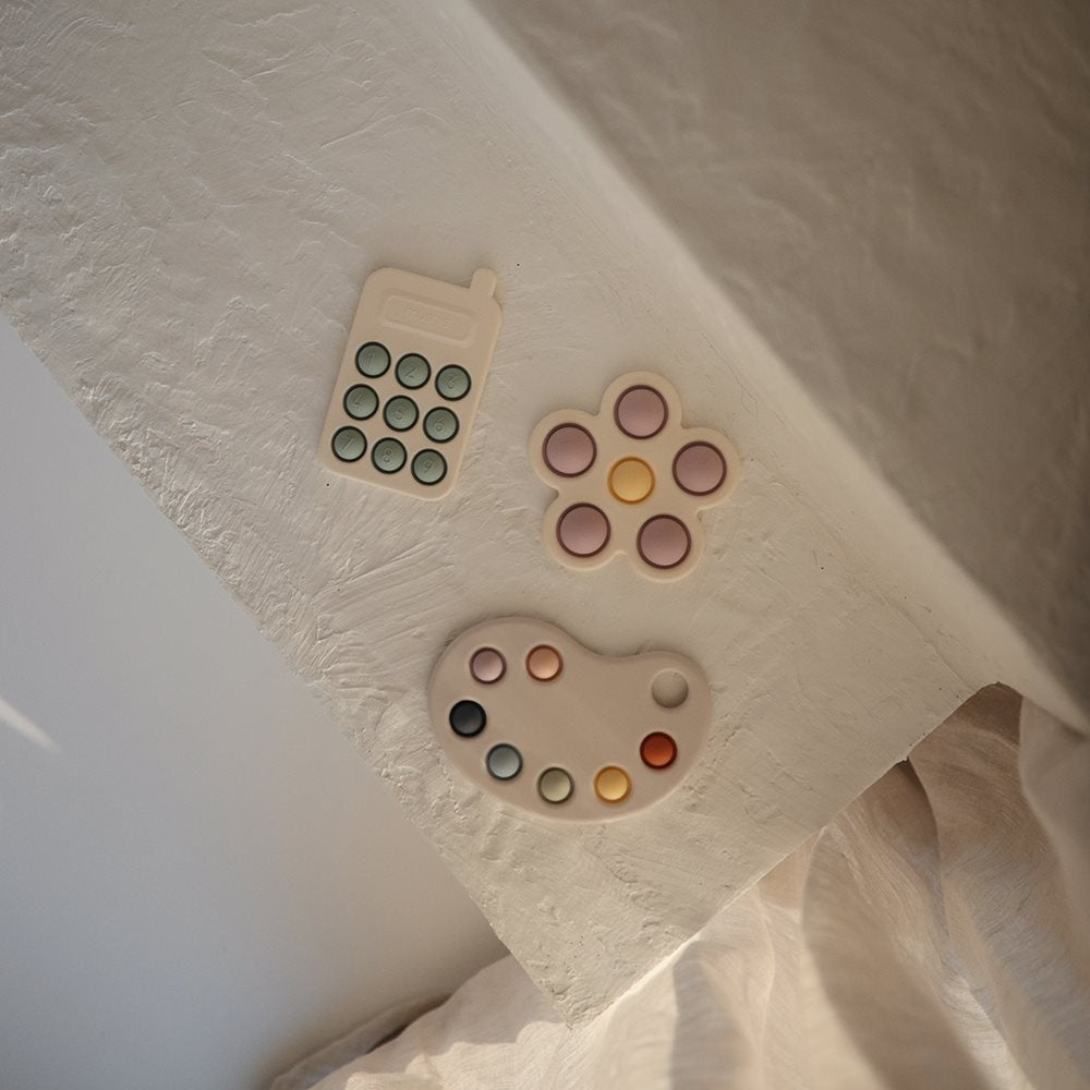 Mushie pop it žaislas Telefonas Tradewinds