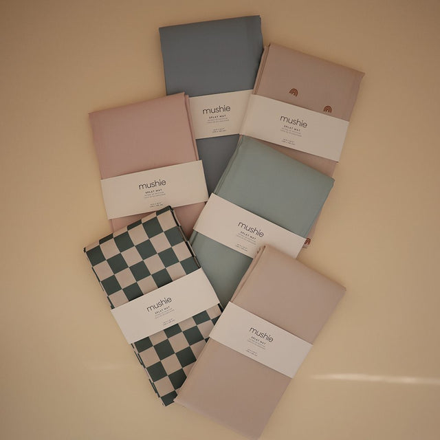 Mushie grindų kilimėlis po kūdikių maitinimo kėdute (Rainbows)