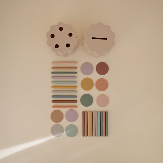 Mushie lavinamasis rūšiavimo žaislas Coin & Tube Sorting Set