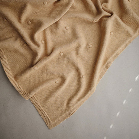 Mushie megztas pledas  Textured Dots Mustard Melange
