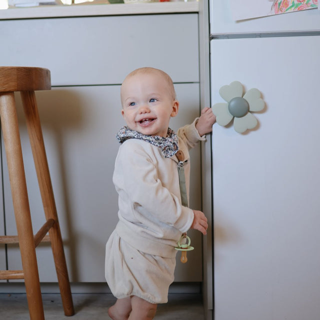 Mushie prilimpantis sukamasis žaislas (spinner) Lucky