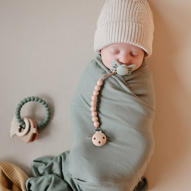 Mushie kramtukas - dantų masažo žiedas (Dino)