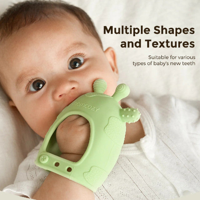 Mushie silikona košļājamā bumbiņa Shifting Sand