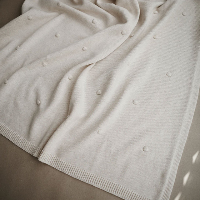 Mushie megztas pledas Textured Dots Baby Blanket (Off White Melange)