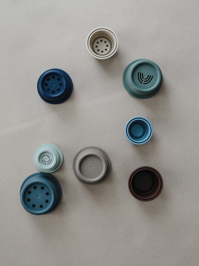 Mushie hariv mänguasja tassitorn - Kroonlehtede värvid