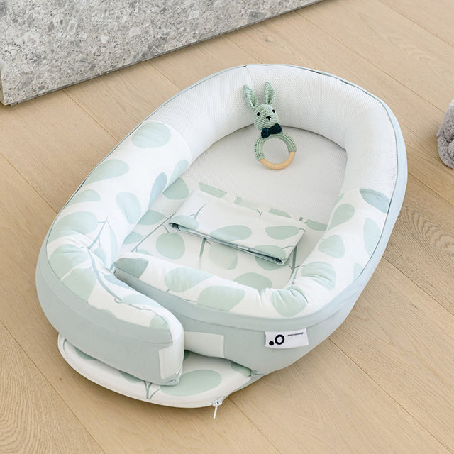Doomoo mazuļu ligzda "Cocoon Leaves Aqua Green"