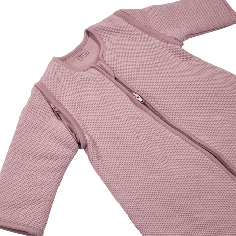 Meyco Baby Studio miegmaišis su kojytėmis, nusegamomis rankovėmis ir atverčiamomis kojinėmis TOG 2.5 Purple Pink