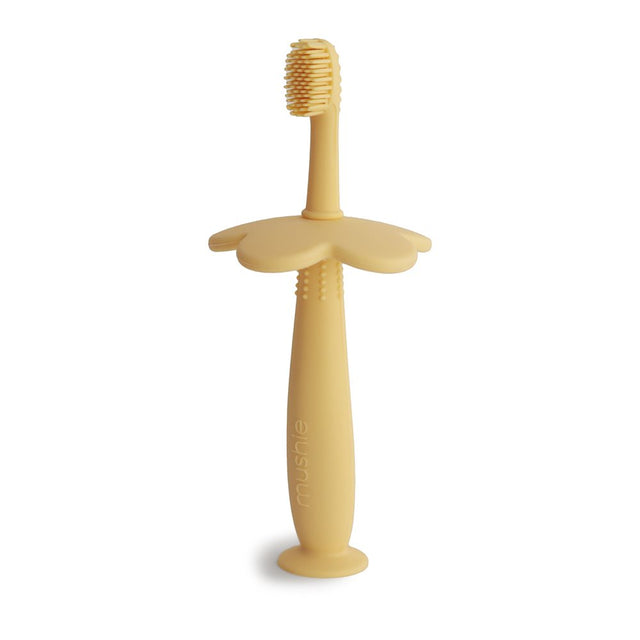 Mushie izglītojoša silikona zobu birste (Blush) 