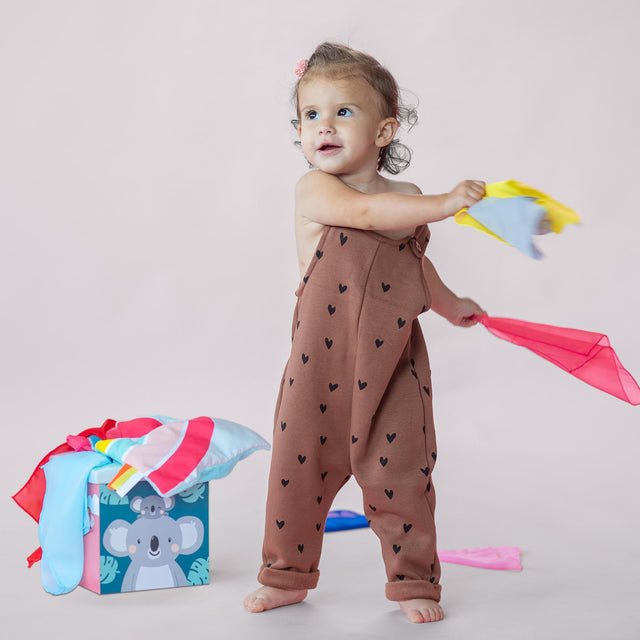 Taf Toys lavinamasis žaislas - jutiminė audinių dėžutė Kimmy Koala Wonder Tissue Box