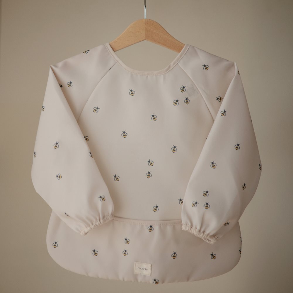 Mushie bib ar piedurknēm Blush